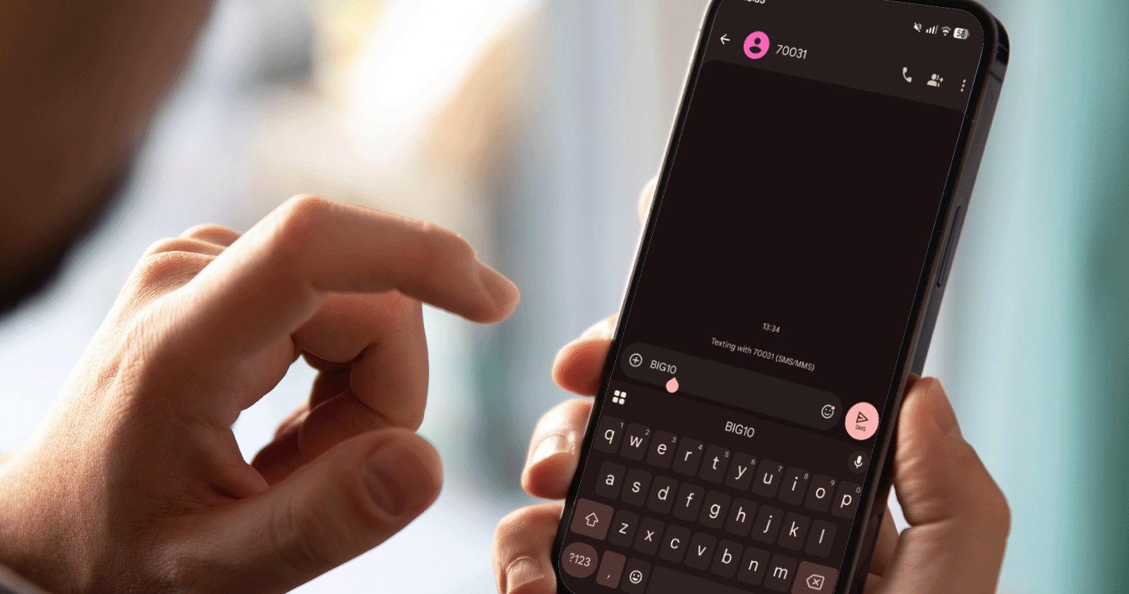 Close up of someone texting to the BFBS Big Salute.