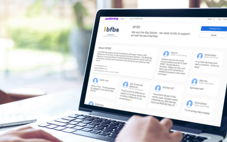 Close up of someone donating to the BFBS Big Salute on a laptop, using JustGiving.