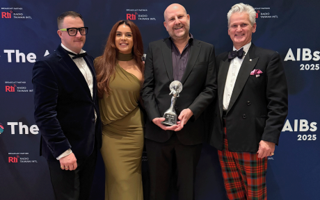 PR photo of the Sitrep team at an awards event where they won an award for 'Best News Coverage'.